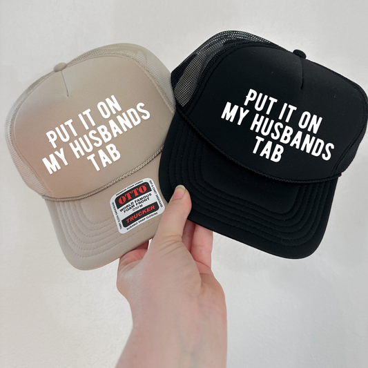 Put it on my Husbands Tab Trucker Hat