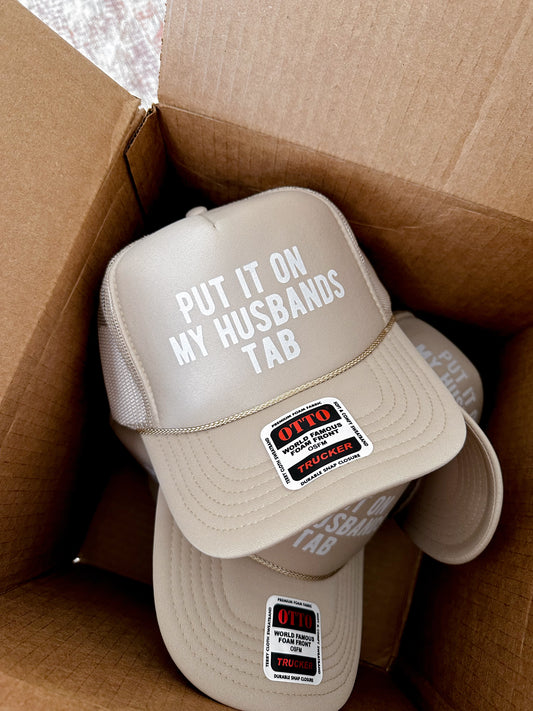 Put it on my Husbands Tab Trucker Hat